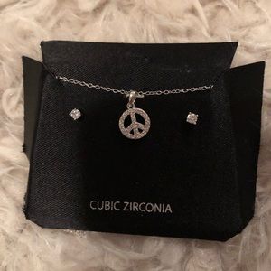 Cubic Zirconia Peace Sign Necklace and Earrings Set.